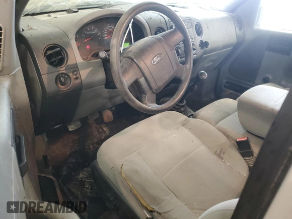 2007 Ford F-150 XL with VIN 1FTRF12237NA02185, listed as a Copart auction lot 52074215 with 204,888 mi miles and Salvage Title. Bid and sale history available at carsss.com. Image 8.