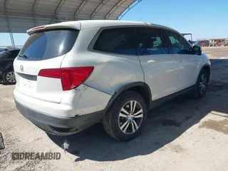 2018 Honda Pilot EX-L with VIN 5FNYF5H54JB009785, listed as a IAAI auction lot 41667784 with 67,296 mi miles. Bid and sale history available at carsss.com. Image 4.