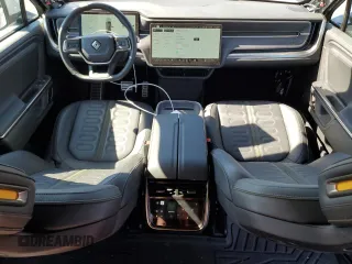 2024 Rivian R1S Adventure with VIN 7PDSGBBA4RN036045, listed as a Copart auction lot 74982414 with 9,256 mi miles and Salvage Title. Bid and sale history available at carsss.com. Image 8.
