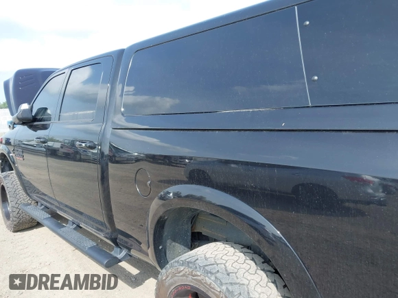2015 Ram 2500 Laramie with VIN 3C6UR5FL0FG655552, listed as a IAAI auction lot 42456897 with 143,885 mi miles and . Bid and sale history available at DreamBid. Image 16.