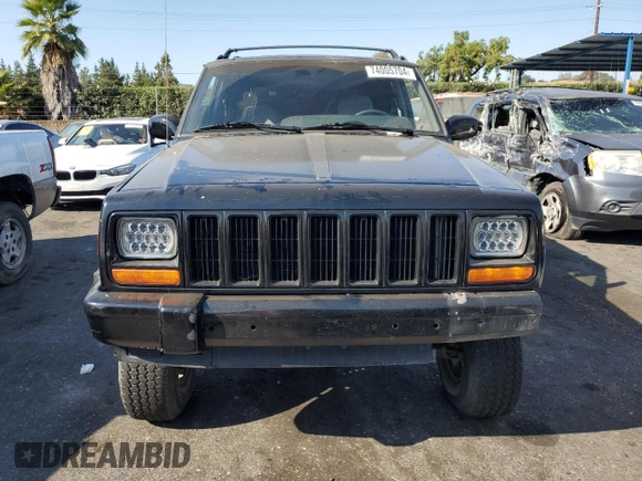 1998 Jeep Cherokee Sport with VIN 1J4FT68S8WL134461, listed as a Copart auction lot 74005704 with 0 mi miles and Salvage Title. Bid and sale history available at carsss.com. Image 5.