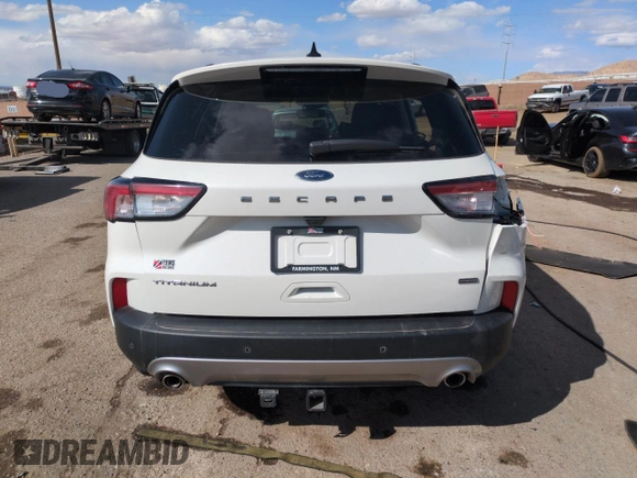 2021 Ford Escape Titanium Hybrid z VIN 1FMCU0DZ2MUB02954, wystawiony jako Copart lot #50558285 z przebiegiem 25 612 mil mil oraz Szkoda całkowita • Salvage title. Historia ofert i sprzedaży dostępna na DreamBid. Obrazek 6.