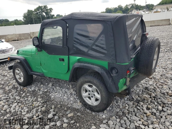 2004 Jeep Wrangler SE with VIN 1J4FA29124P769475, listed as a Copart auction lot 64371244 with 136,877 mi miles and Salvage title. Bid and sale history available at DreamBid. Image 2.