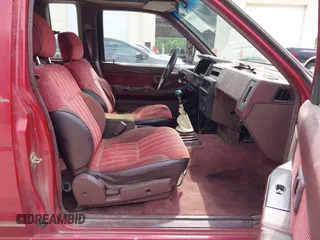 1990 Nissan Hardbody with VIN 1N6HD16S2LC394462, listed as a IAAI auction lot 42623095 with 411,846 mi miles and . Bid and sale history available at DreamBid. Image 5.