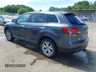 2014 Mazda CX-9 Touring with VIN JM3TB3CV9E0426767, listed as a IAAI auction lot 42301021 with 129,497 mi miles and . Bid and sale history available at DreamBid. Image 3.