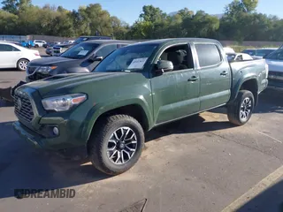 2021 Toyota Tacoma SR with VIN 3TYCZ5AN2MT039450, listed as a IAAI auction lot 40457613 with 54,176 mi miles and . Bid and sale history available at DreamBid. Image 17.