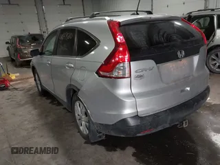 2013 Honda CR-V EX-L with VIN 2HKRM3H72DH504122, listed as a IAAI auction lot 41647580 with 217,451 mi miles and . Bid and sale history available at DreamBid. Image 3.