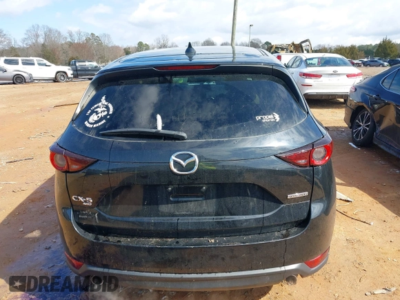 2020 Mazda CX-5 Touring z VIN JM3KFBCMXL1741182, wystawiony jako IAAI lot #41602315 z przebiegiem 31 582 mil mil oraz . Historia ofert i sprzedaży dostępna na DreamBid. Obrazek 17.