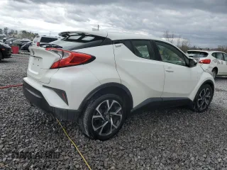 2018 Toyota C-HR XLE z VIN JTNKHMBXXJ1003871, wystawiony jako Copart lot #49984355 z przebiegiem 101 395 mil mil oraz Szkoda całkowita • Salvage title. Historia ofert i sprzedaży dostępna na DreamBid. Obrazek 3.