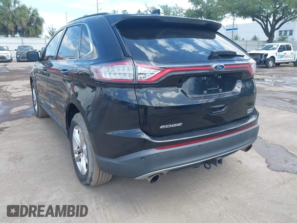 2015 Ford Edge SEL with VIN 2FMTK4J90FBB02669, listed as a IAAI auction lot 42176184 with 213,465 mi miles. Bid and sale history available at carsss.com. Image 3.