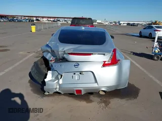 2014 Nissan 370Z Nismo with VIN JN1AZ4EHXEM634418, listed as a IAAI auction lot 41308580 with 84,074 mi miles and . Bid and sale history available at DreamBid. Image 16.