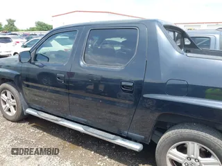 2011 Honda Ridgeline RTL with VIN 5FPYK1F54BB011472, listed as a IAAI auction lot 42112512 with 194,974 mi miles and . Bid and sale history available at DreamBid. Image 14.