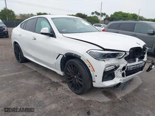 2021 BMW X6 xDrive40i with VIN 5UXCY6C00M9F88215, listed as a IAAI auction lot 41646498 with 43,587 mi miles. Bid and sale history available at carsss.com. Image 1.