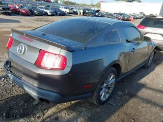 2010 Ford Mustang V6 with VIN 1ZVBP8AN6A5157773, listed as a IAAI auction lot 41921156 with 118,549 mi miles. Bid and sale history available at carsss.com. Image 4.