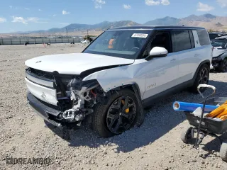 2023 Rivian R1S Launch Edition with VIN 7PDSGABLXPN004161, listed as a Copart auction lot 67390954 with 0 mi miles and Salvage Title. Bid and sale history available at carsss.com. Image 1.