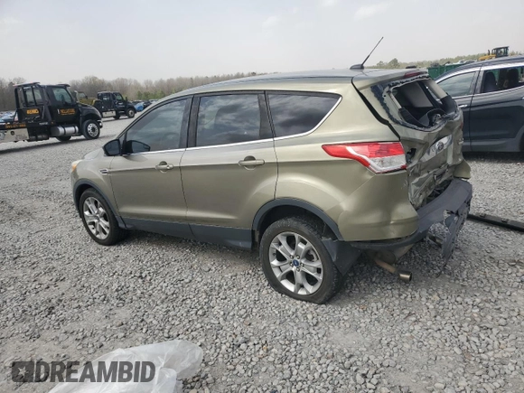 2013 Ford Escape SEL with VIN 1FMCU9H96DUA72579, listed as a Copart auction lot 49323715 with 155,530 mi miles and Salvage Title. Bid and sale history available at DreamBid. Image 2.