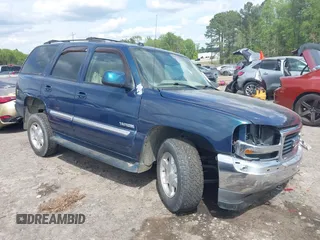 2005 GMC Yukon SLT z VIN 1GKEK13T25J130847, wystawiony jako IAAI lot #42009527 z przebiegiem 147 561 mil mil oraz . Historia ofert i sprzedaży dostępna na DreamBid. Obrazek 1.