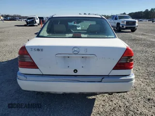 1996 Mercedes-Benz C with VIN WDBHA28E8TF389546, listed as a Copart auction lot 86340144 with 314,364 mi miles and Salvage Title. Bid and sale history available at carsss.com. Image 6.