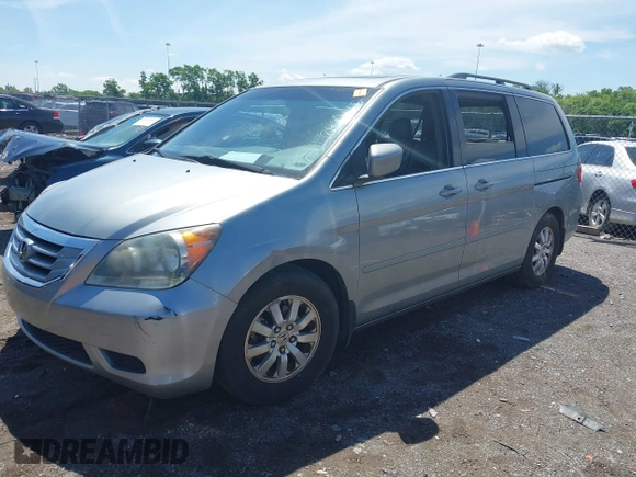 2010 Honda Odyssey EX-L with VIN 5FNRL3H62AB103044, listed as a IAAI auction lot 42199282 with 220,801 mi miles and . Bid and sale history available at DreamBid. Image 2.