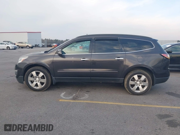2015 Chevrolet Traverse LTZ with VIN 1GNKVJKDXFJ206159, listed as a IAAI auction lot 41762515 with 143,062 mi miles and . Bid and sale history available at DreamBid. Image 14.