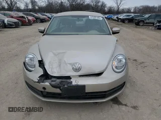 2012 Volkswagen Beetle 2.5L with VIN 3VWJX7AT0CM660829, listed as a Copart auction lot 87930105 with 71,240 mi miles and Salvage Title. Bid and sale history available at carsss.com. Image 5.