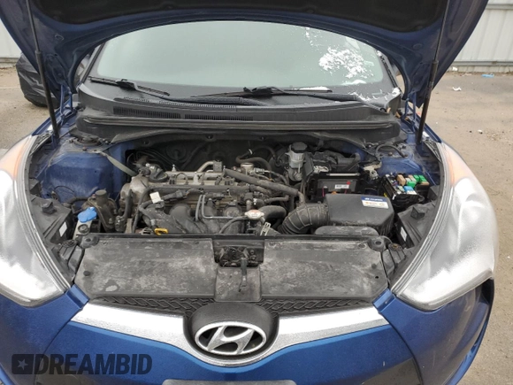 2016 Hyundai Veloster z VIN KMHTC6AD6GU304196, wystawiony jako Copart lot #43694185 z przebiegiem 63 516 mil mil oraz Szkoda całkowita • Salvage title. Historia ofert i sprzedaży dostępna na DreamBid. Obrazek 11.