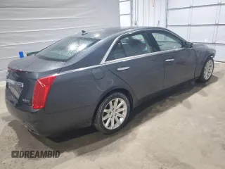 2014 Cadillac CTS Luxury AWD z VIN 1G6AX5SX5E0185132, wystawiony jako Copart lot #52292465 z przebiegiem 69 344 mil mil oraz Szkoda całkowita • Salvage title. Historia ofert i sprzedaży dostępna na DreamBid. Obrazek 3.