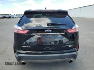 2019 Ford Edge Titanium z VIN 2FMPK3K93KBB54561, wystawiony jako Copart lot #56746065 z przebiegiem 101 792 mil mil oraz Szkoda całkowita • Salvage title. Historia ofert i sprzedaży dostępna na DreamBid. Obrazek 6.