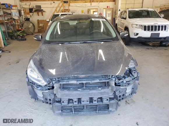 2015 Ford Focus SE with VIN 1FADP3F21FL369096, listed as a Copart auction lot 50755675 with 94,016 mi miles and Salvage Title. Bid and sale history available at carsss.com. Image 5.