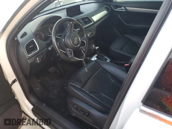 2015 Audi Q3 Premium Plus z VIN WA1BFCFS7FR002537, wystawiony jako Copart lot #77711754 z przebiegiem 78 024 mil mil oraz Szkoda całkowita • Salvage title. Historia ofert i sprzedaży dostępna na DreamBid. Obrazek 7.