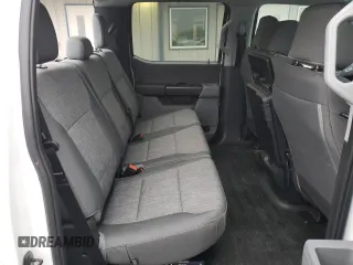 2023 Ford F-150 XL with VIN 1FTFW1E86PKG13350, listed as a Copart auction lot 87603215 with 12,534 mi miles and Salvage title. Bid and sale history available at DreamBid. Image 10.