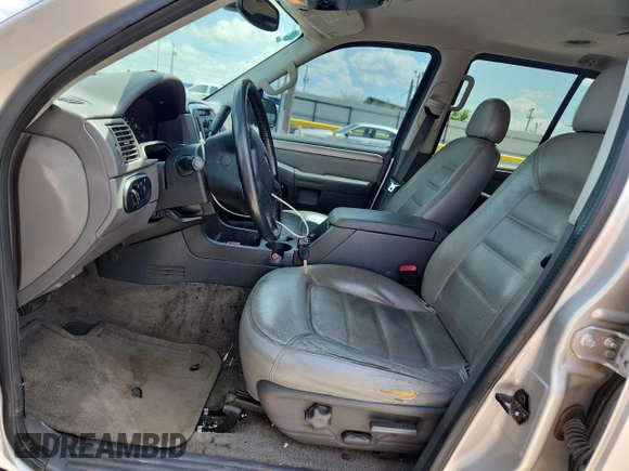2004 Ford Explorer XLT z VIN 1FMZU63K84ZA25995, wystawiony jako Copart lot #64020595 z przebiegiem 239 155 mil mil oraz Szkoda całkowita • Salvage title. Historia ofert i sprzedaży dostępna na DreamBid. Obrazek 7.