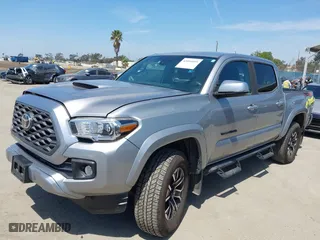 2021 Toyota Tacoma 4WD SR with VIN 3TMCZ5AN6MM393306, listed as a IAAI auction lot 42094095 with 57,217 mi miles. Bid and sale history available at carsss.com. Image 18.