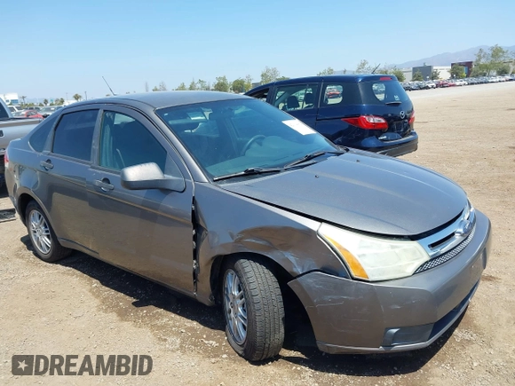 2009 Ford Focus SE with VIN 1FAHP35N69W244451, listed as a IAAI auction lot 42104982 with 199,524 mi miles. Bid and sale history available at carsss.com. Image 6.
