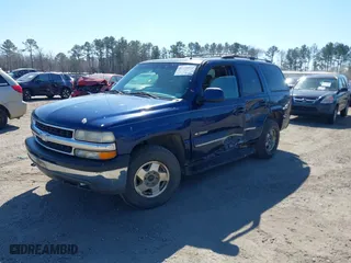 2002 Chevrolet Tahoe LT with VIN 1GNEK13Z62J160310, listed as a IAAI auction lot 41710379 with 154,873 mi miles. Bid and sale history available at carsss.com. Image 2.