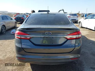 2018 Ford Fusion SE z VIN 3FA6P0LU8JR116073, wystawiony jako IAAI lot #41773037 z przebiegiem 100 864 mil mil oraz . Historia ofert i sprzedaży dostępna na DreamBid. Obrazek 16.