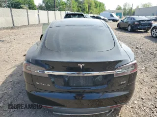 2016 Tesla Model S 90D with VIN 5YJSA1E28GF131212, listed as a Copart auction lot 54176705 with 97,373 mi miles and Salvage Title. Bid and sale history available at DreamBid. Image 6.