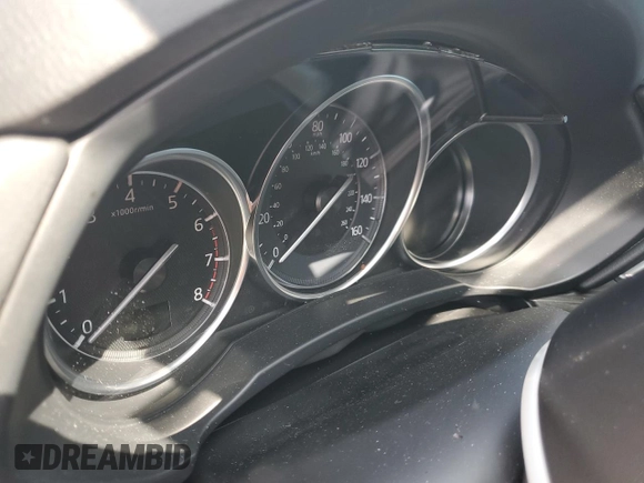 2018 Mazda CX-5 Grand Touring z VIN JM3KFADM3J1464073, wystawiony jako Copart lot #59571385 z przebiegiem Nie podano mil oraz Szkoda całkowita • Salvage title. Historia ofert i sprzedaży dostępna na DreamBid. Obrazek 9.