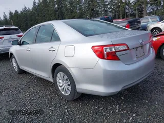 2014 Toyota Camry L with VIN 4T4BF1FK8ER419012, listed as a IAAI auction lot 41819331 with 84,372 mi miles and . Bid and sale history available at DreamBid. Image 3.