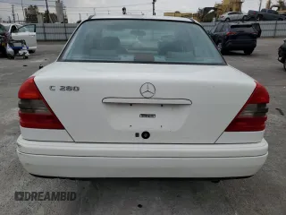1997 Mercedes-Benz C with VIN WDBHA28E3VF582237, listed as a Copart auction lot 76826534 with 240,702 mi miles and Clean Title. Bid and sale history available at carsss.com. Image 6.