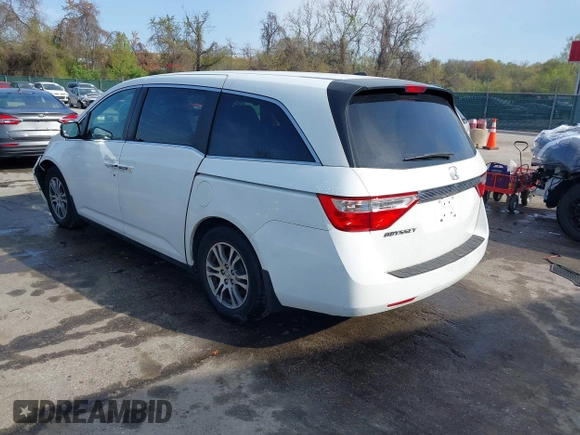 2011 Honda Odyssey EX-L with VIN 5FNRL5H6XBB059162, listed as a IAAI auction lot 42061378 with 164,317 mi miles and . Bid and sale history available at carsss.com. Image 3.