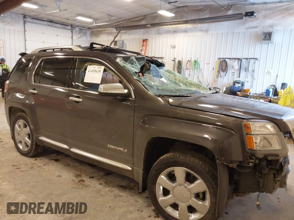 2015 GMC Terrain Denali z VIN 2GKFLZE3XF6419468, wystawiony jako IAAI lot #41455635 z przebiegiem Nie podano mil oraz . Historia ofert i sprzedaży dostępna na DreamBid. Obrazek 1.