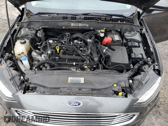 2020 Ford Fusion SE z VIN 3FA6P0HD1LR252332, wystawiony jako Copart lot #58123365 z przebiegiem 76 410 mil mil oraz Szkoda całkowita • Salvage title. Historia ofert i sprzedaży dostępna na DreamBid. Obrazek 11.