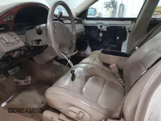 2004 Cadillac DeVille z VIN 1G6KD54Y84U137828, wystawiony jako Copart lot #53702265 z przebiegiem 156 439 mil mil oraz Szkody całkowita. Historia ofert i sprzedaży dostępna na DreamBid. Obrazek 7.