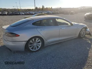 2016 Tesla Model S 90D with VIN 5YJSA1E26GF147974, listed as a Copart auction lot 82815404 with 126,609 mi miles and Salvage Title. Bid and sale history available at DreamBid. Image 3.