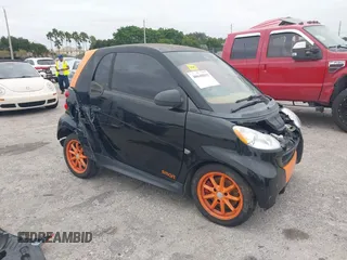 2008 Smart fortwo Pure with VIN WMEEJ31X68K157811, listed as a IAAI auction lot 40640815 with 128,431 mi miles and . Bid and sale history available at DreamBid. Image 1.