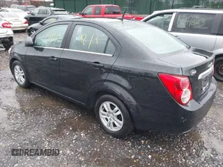 2012 Chevrolet Sonic LT z VIN 1G1JC5SH2C4201478, wystawiony jako IAAI lot #40933718 z przebiegiem 140 077 mil mil oraz . Historia ofert i sprzedaży dostępna na DreamBid. Obrazek 3.