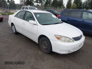 2004 Toyota Camry LE with VIN JTDBE32K840256161, listed as a IAAI auction lot 42000050 with 367,016 mi miles. Bid and sale history available at carsss.com. Image 1.