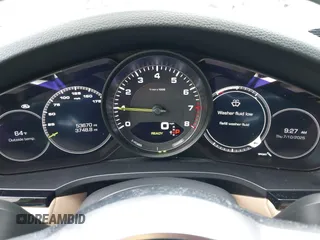 2019 Porsche Cayenne E-Hybrid z VIN WP1AE2AY0KDA52065, wystawiony jako IAAI lot #42687097 z przebiegiem 53 670 mil mil oraz . Historia ofert i sprzedaży dostępna na DreamBid. Obrazek 7.