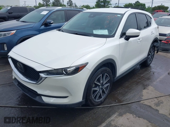 2018 Mazda CX-5 Touring with VIN JM3KFBCMXJ0366008, listed as a IAAI auction lot 42079989 with 153,868 mi miles and . Bid and sale history available at DreamBid. Image 17.